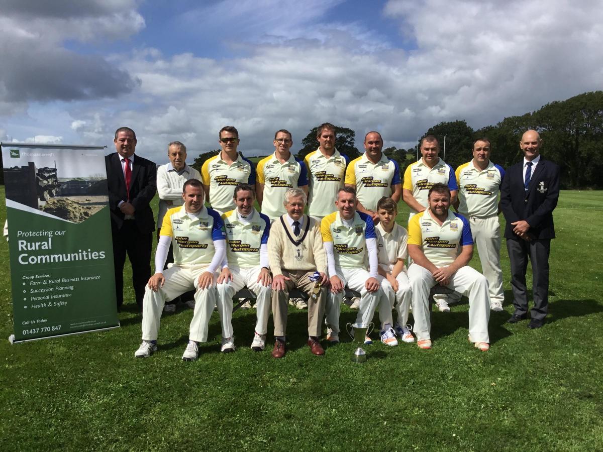 Laugharne Cricket Club are presented with their silverware after ...